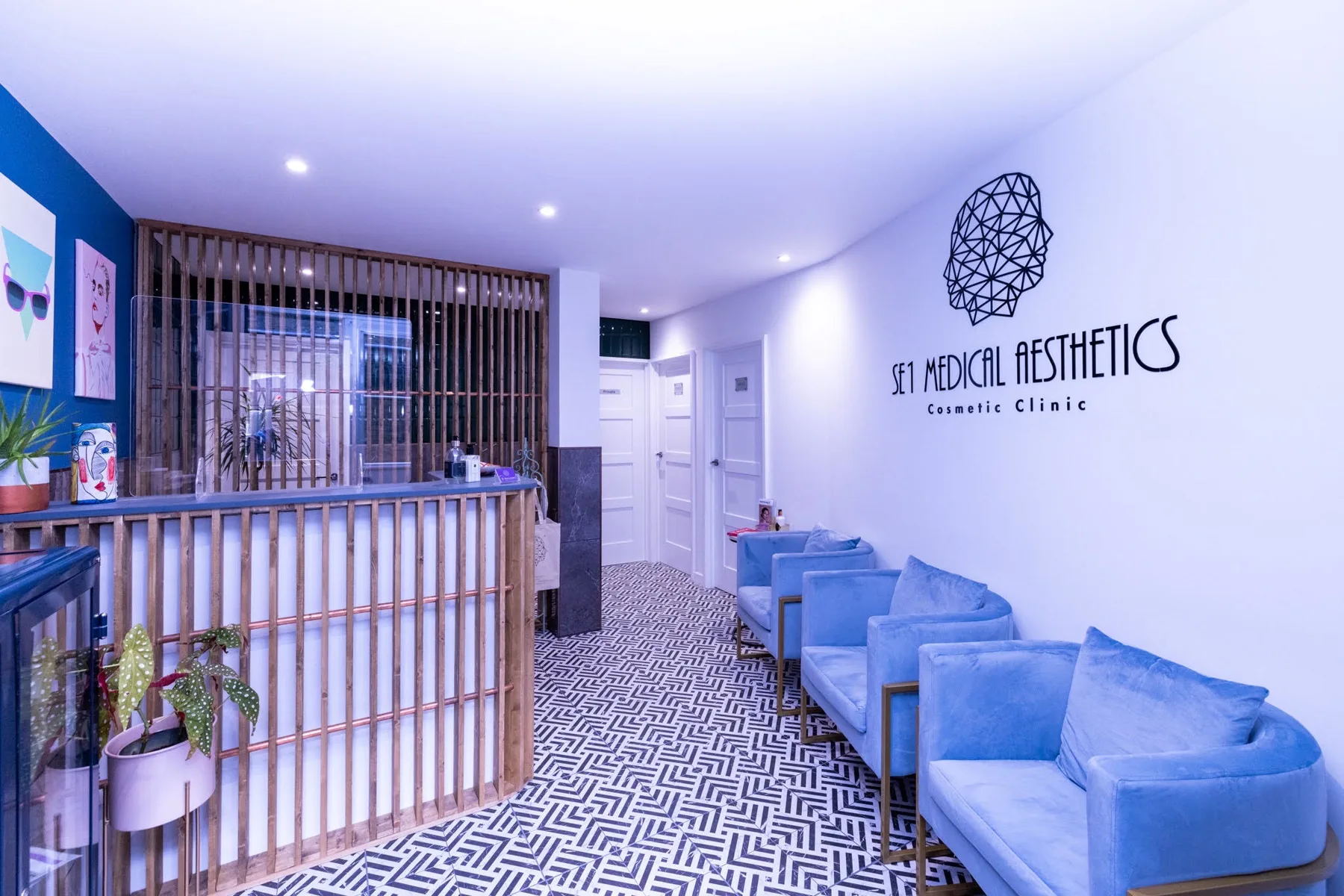 Bermondsey Street clinic waiting area with three blue chairs